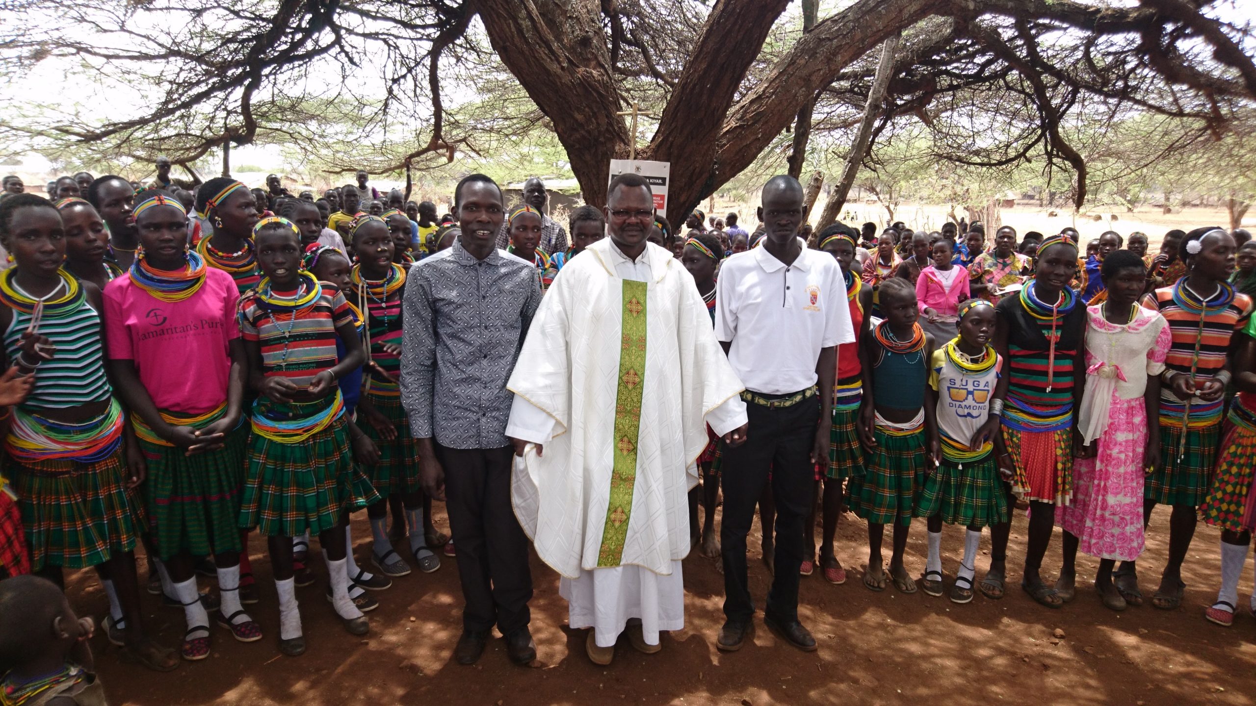 Fr. Paul NGOLE with the Christians of Nakiloro after Sunday Mass